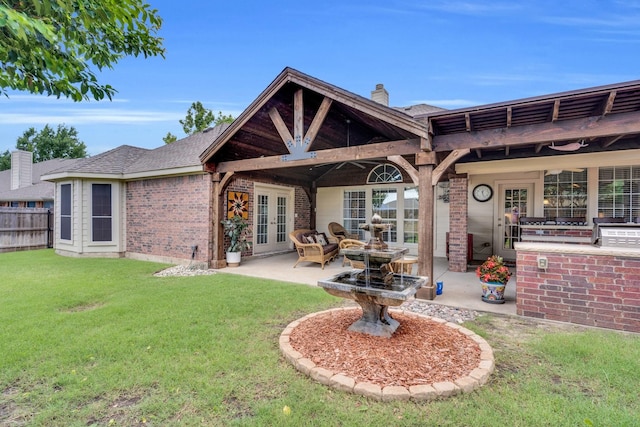 5210 Medallion Ct, Midlothian, TX 76065 - rear view of house with french doors, brick siding, a patio area, a chimney, and roof with shingles