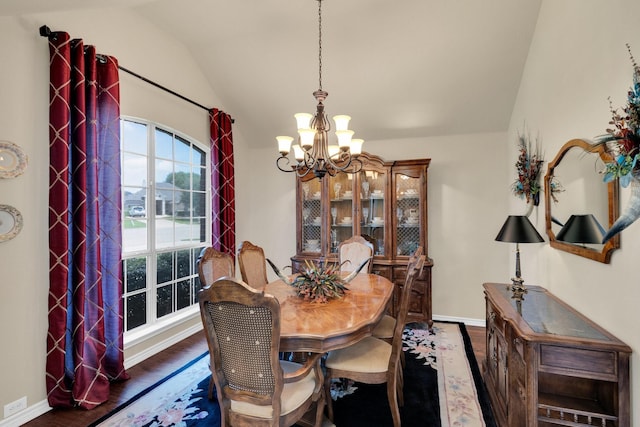 5210 Medallion Ct, Midlothian, TX 76065 - dining area with a chandelier, wood finished floors, vaulted ceiling, and baseboards