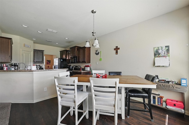 7530 Park Ave, Forest Hill, TX 76140 - dining room with dark wood-style flooring and recessed lighting