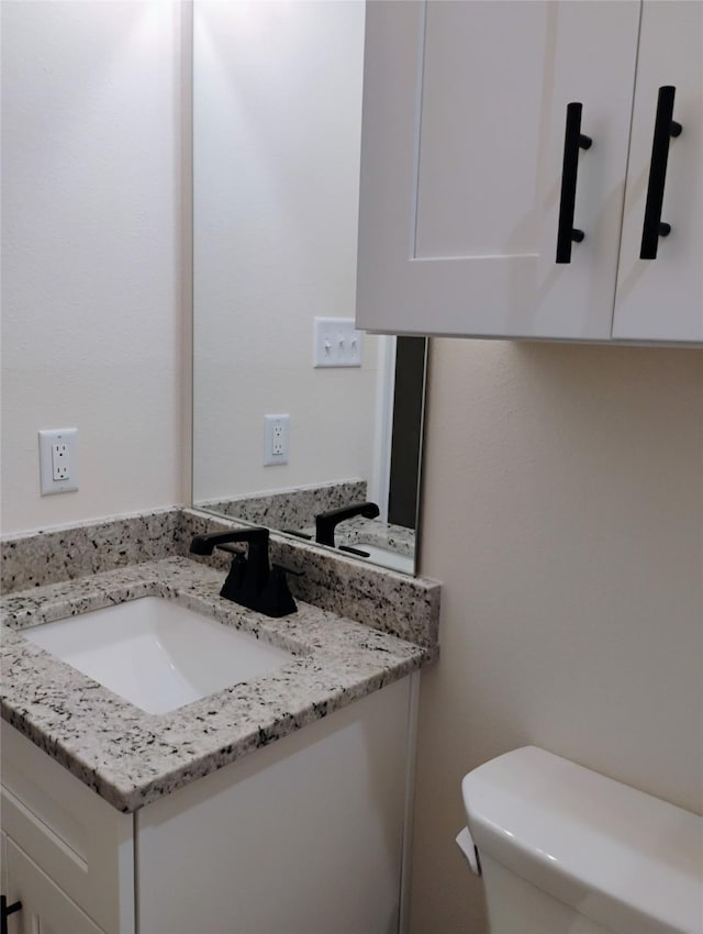 901 SW 10th St, Mineral Wells, TX 76067 - half bath with vanity and toilet