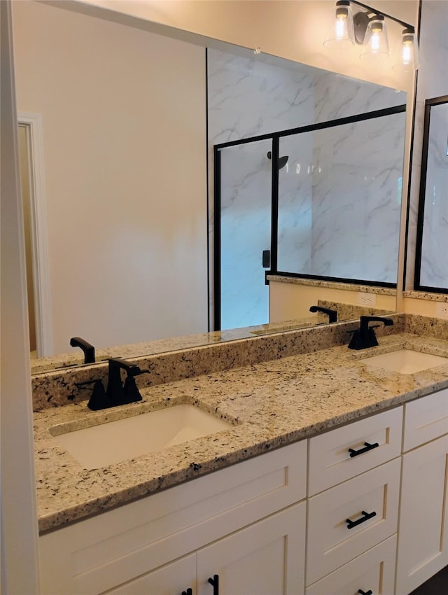 901 SW 10th St, Mineral Wells, TX 76067 - bathroom featuring double vanity and a marble finish shower