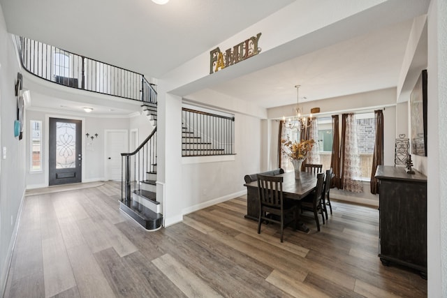 1305 Mary Horn Ln, Aubrey, TX 76227 - dining space featuring wood finished floors, stairway, and baseboards