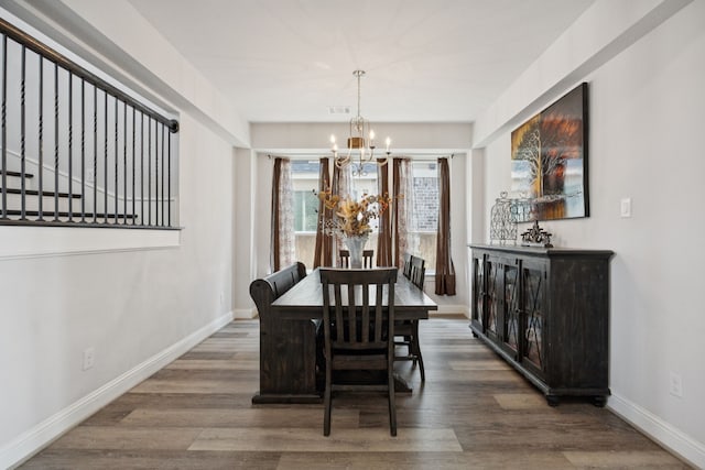 1305 Mary Horn Ln, Aubrey, TX 76227 - dining area with a chandelier, wood finished floors, and baseboards