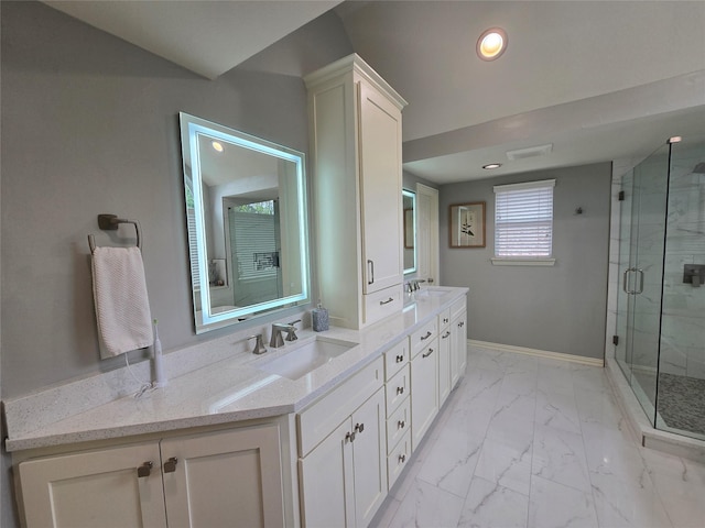 1504 Blossom Ct, Allen, TX 75013 - bathroom featuring double vanity, marble look tile flooring, a stall shower, recessed lighting, and baseboards