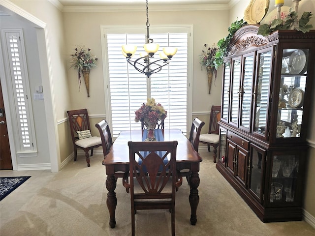 1504 Blossom Ct, Allen, TX 75013 - dining space featuring a chandelier, light colored carpet, crown molding, and baseboards