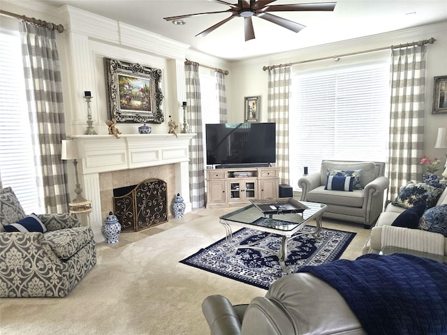 1504 Blossom Ct, Allen, TX 75013 - carpeted living area featuring a ceiling fan, ornamental molding, and a fireplace
