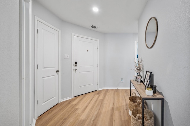 900 Sapphire Dr, Princeton, TX 75407 - foyer entrance with light wood-style flooring and baseboards