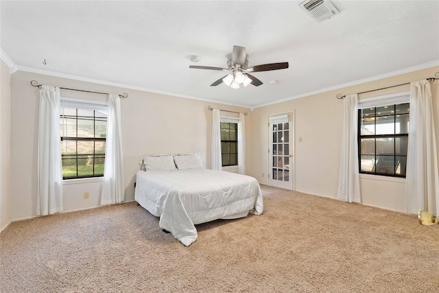 2801 Good Shepherd Dr, Brownwood, TX 76801 - carpeted bedroom with ornamental molding and a ceiling fan