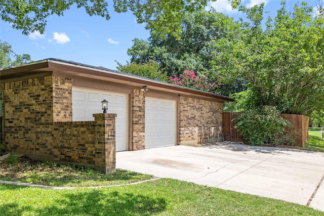 2801 Good Shepherd Dr, Brownwood, TX 76801 - garage featuring concrete driveway