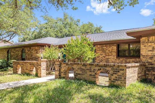 2801 Good Shepherd Dr, Brownwood, TX 76801 - view of front of home with brick siding and a shingled roof