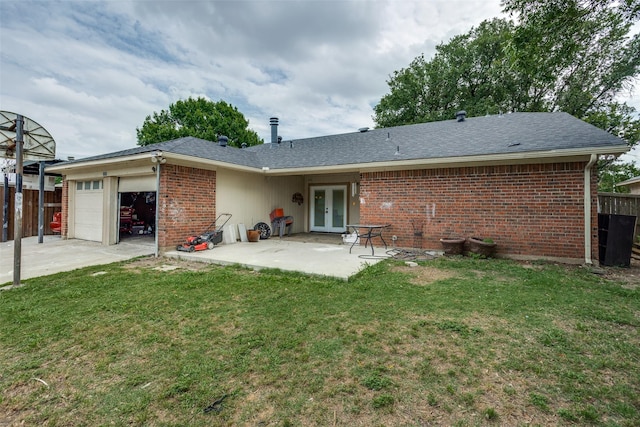 1321 Glyndon Dr, Plano, TX 75023 - rear view of house with french doors, brick siding, a garage, and driveway