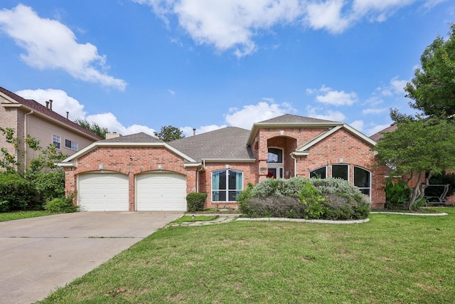 4616 Heatherbrook Ln, Grand Prairie, TX 75052 - traditional home with brick siding, an attached garage, a front lawn, concrete driveway, and a shingled roof