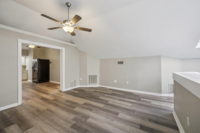 4616 Heatherbrook Ln, Grand Prairie, TX 75052 - additional living space with a ceiling fan, baseboards, vaulted ceiling, and wood finished floors