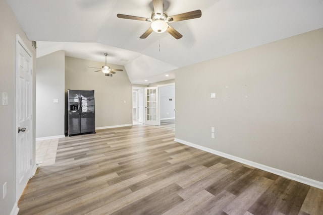 4616 Heatherbrook Ln, Grand Prairie, TX 75052 - unfurnished living room with ceiling fan, lofted ceiling, baseboards, light wood-style floors, and recessed lighting