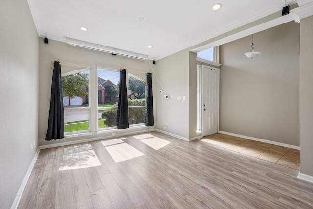 4616 Heatherbrook Ln, Grand Prairie, TX 75052 - unfurnished room featuring crown molding, wood finished floors, baseboards, and recessed lighting