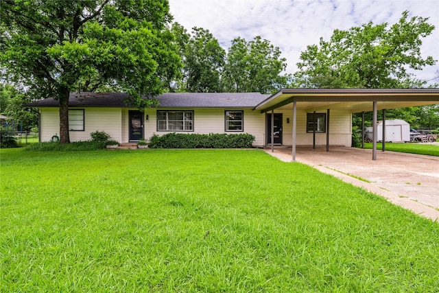 522 E Kempner St, Mabank, TX 75147 - view of front of property with concrete driveway, a front lawn, and an attached carport
