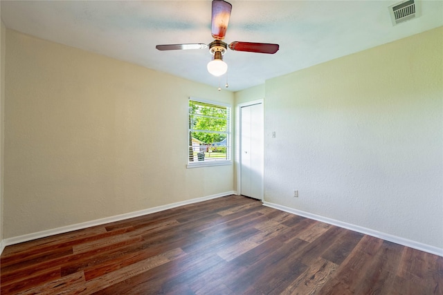 522 E Kempner St, Mabank, TX 75147 - empty room featuring dark wood-type flooring, baseboards, and ceiling fan