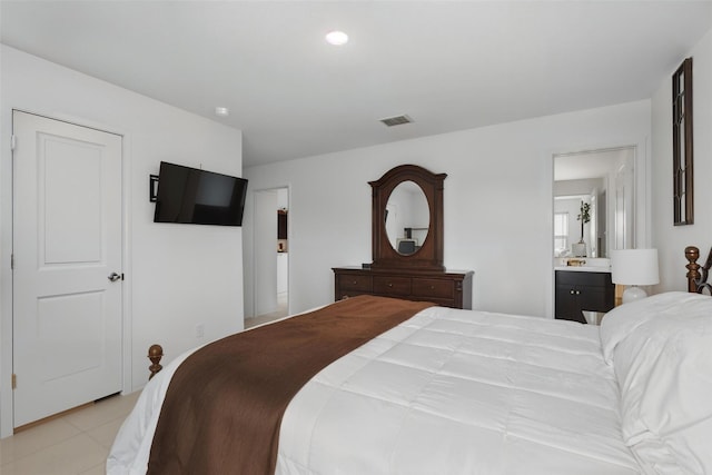 8329 Grand Oak Rd, Fort Worth, TX 76123 - bedroom featuring light tile patterned flooring and connected bathroom