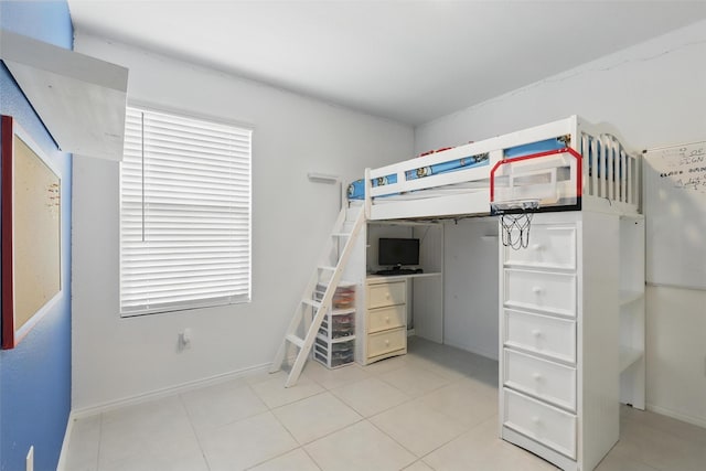 8329 Grand Oak Rd, Fort Worth, TX 76123 - bedroom with light tile patterned floors and baseboards