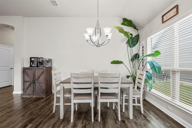 3009 Gilchrist Dr, Lorena, TX 76655 - dining room with arched walkways, wood finished floors, a chandelier, lofted ceiling, and baseboards