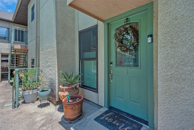 5701 Gaston Ave Unit 8, Dallas, TX 75214 - property entrance featuring stucco siding