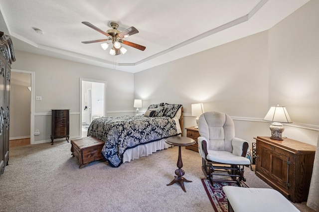 1507 Glade Point Dr, Coppell, TX 75019 - carpeted bedroom featuring a raised ceiling and a ceiling fan