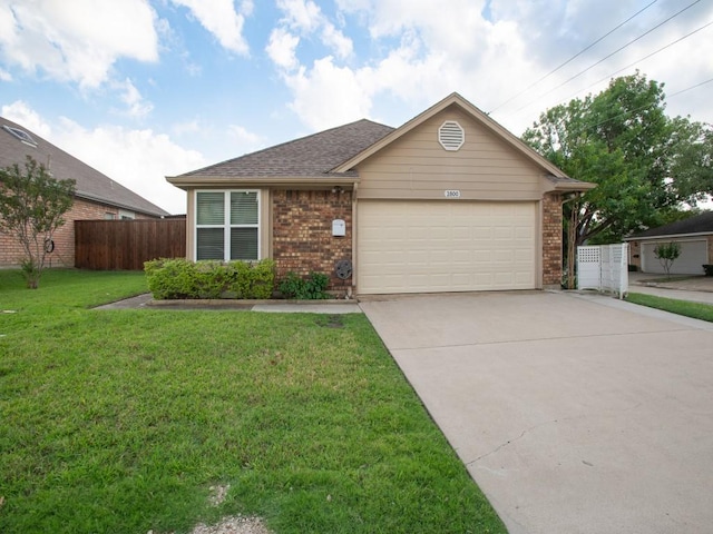 2800 Country Villa Cir, Carrollton, TX 75006 - view of front of home featuring brick siding, an attached garage, and driveway