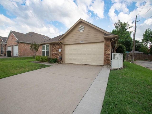 2800 Country Villa Cir, Carrollton, TX 75006 - ranch-style house featuring brick siding, a garage, a front yard, and concrete driveway