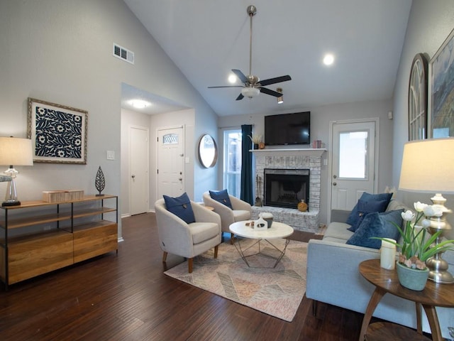 2800 Country Villa Cir, Carrollton, TX 75006 - living area with a brick fireplace, a ceiling fan, wood finished floors, and high vaulted ceiling