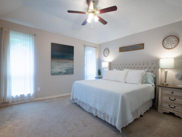2800 Country Villa Cir, Carrollton, TX 75006 - bedroom featuring multiple windows, light colored carpet, a ceiling fan, and baseboards
