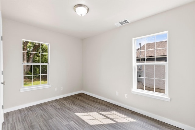 5937 Boone St, Sachse, TX 75048 - unfurnished room featuring wood finished floors