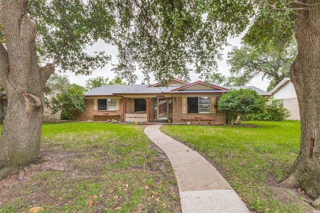 2029 Aloha Dr, Mesquite, TX 75150 - single story home featuring brick siding and a front lawn