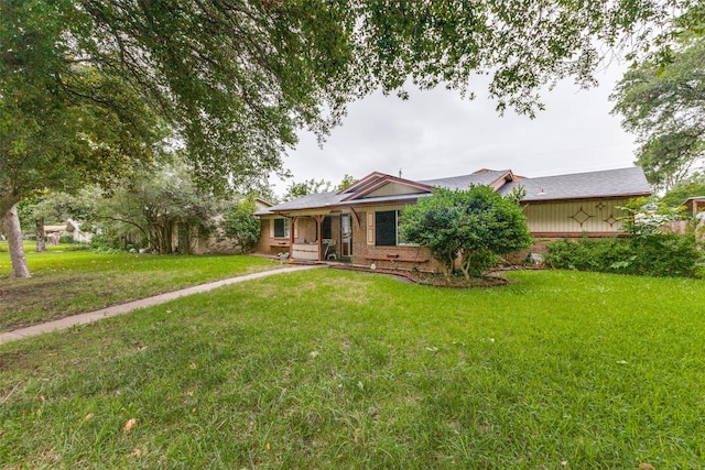 2029 Aloha Dr, Mesquite, TX 75150 - single story home with a front lawn, brick siding, and a porch