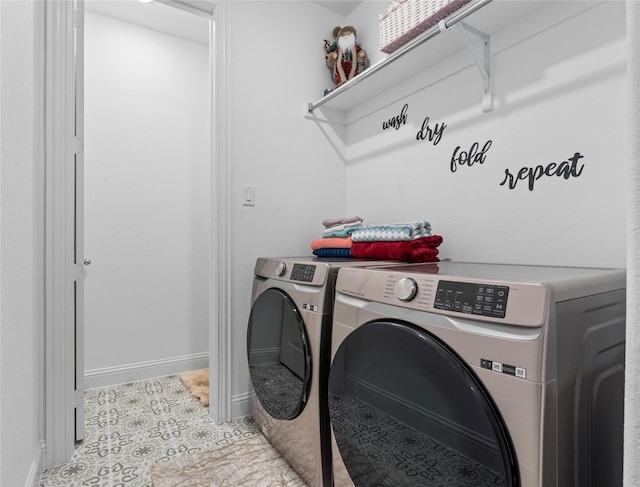 1431 Cypress Thorn Dr, Arlington, TX 76005 - laundry area with washing machine and dryer, baseboards, and light tile patterned floors