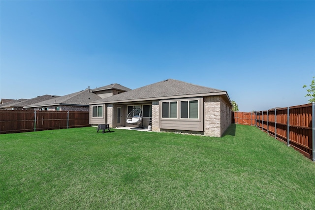 3615 Big Nemaha Dr, Crandall, TX 75114 - rear view of house with brick siding, a patio, and a shingled roof