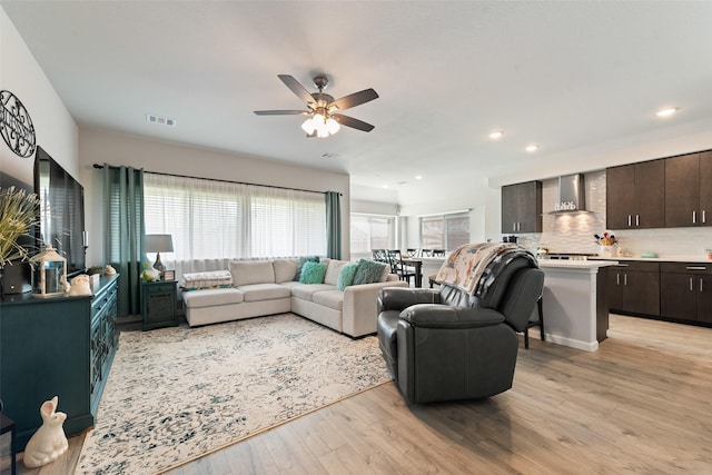 3615 Big Nemaha Dr, Crandall, TX 75114 - living room with light wood-type flooring, ceiling fan, and recessed lighting