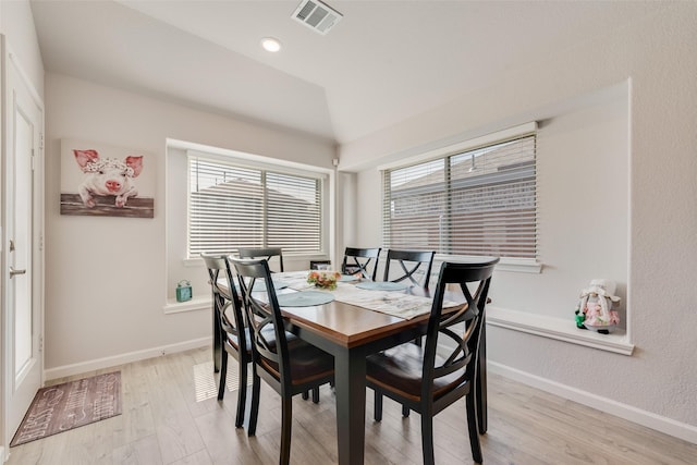 3615 Big Nemaha Dr, Crandall, TX 75114 - dining space with light wood-style flooring, baseboards, and lofted ceiling