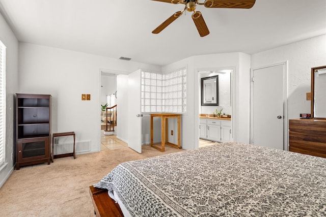 818 Placid Dr, Mesquite, TX 75150 - bedroom with light carpet and connected bathroom