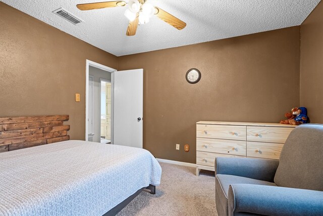 818 Placid Dr, Mesquite, TX 75150 - bedroom with carpet, a textured ceiling, a ceiling fan, baseboards, and a textured wall