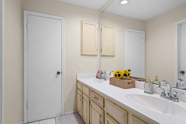 818 Placid Dr, Mesquite, TX 75150 - bathroom featuring double vanity and tile patterned flooring