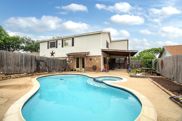 818 Placid Dr, Mesquite, TX 75150 - view of pool with a fenced backyard, a patio area, and a pool with connected hot tub