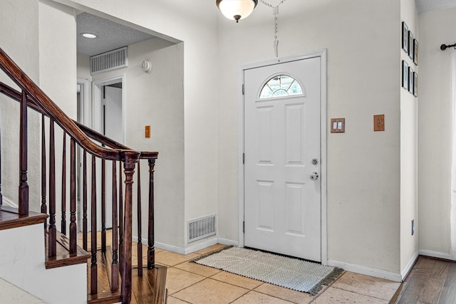818 Placid Dr, Mesquite, TX 75150 - entrance foyer with baseboards and stairs
