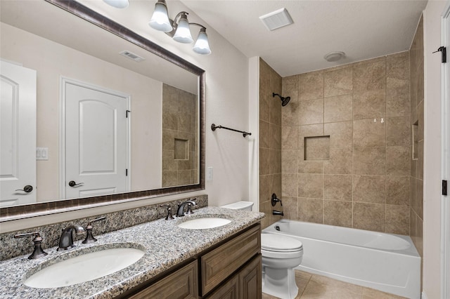 2504 Las Palmas Ln, Plano, TX 75075 - full bath featuring double vanity, tile patterned flooring, toilet, and bathtub / shower combination