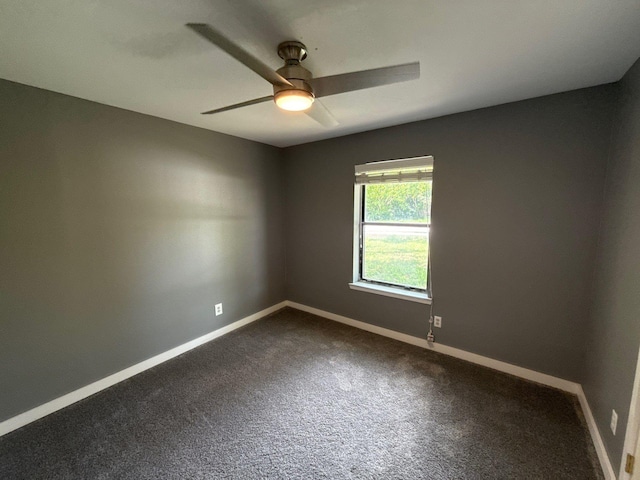 137 W 6th St, Krum, TX 76249 - empty room with ceiling fan, baseboards, and dark carpet