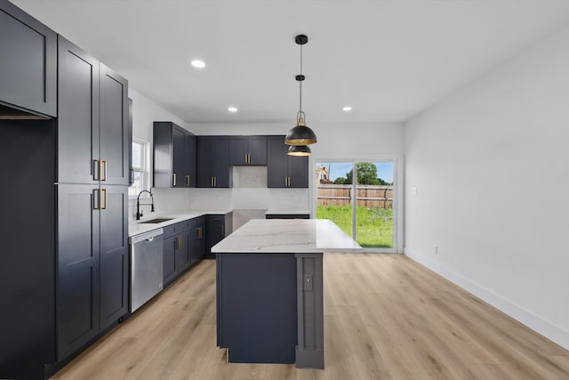 3923 Le May Ave, Dallas, TX 75216 - kitchen with dishwasher, a sink, light wood-style floors, recessed lighting, and decorative light fixtures