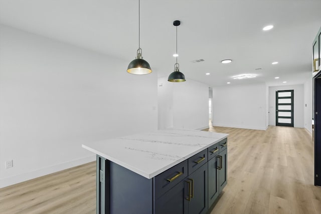 3923 Le May Ave, Dallas, TX 75216 - kitchen featuring light wood finished floors, a kitchen island, recessed lighting, baseboards, and hanging light fixtures