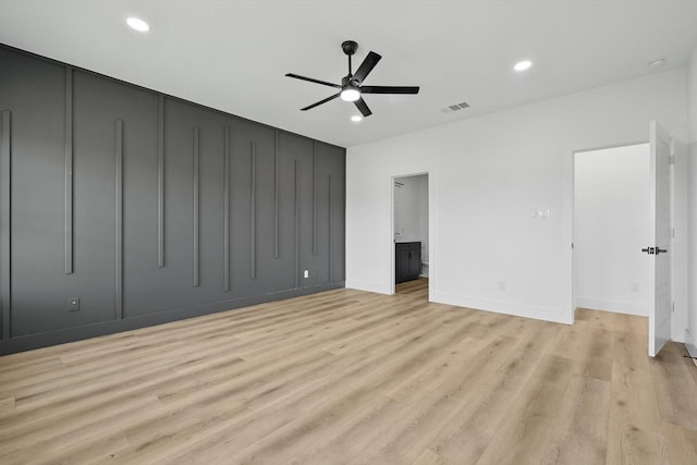 3923 Le May Ave, Dallas, TX 75216 - unfurnished bedroom featuring light wood-style floors, baseboards, recessed lighting, connected bathroom, and a ceiling fan