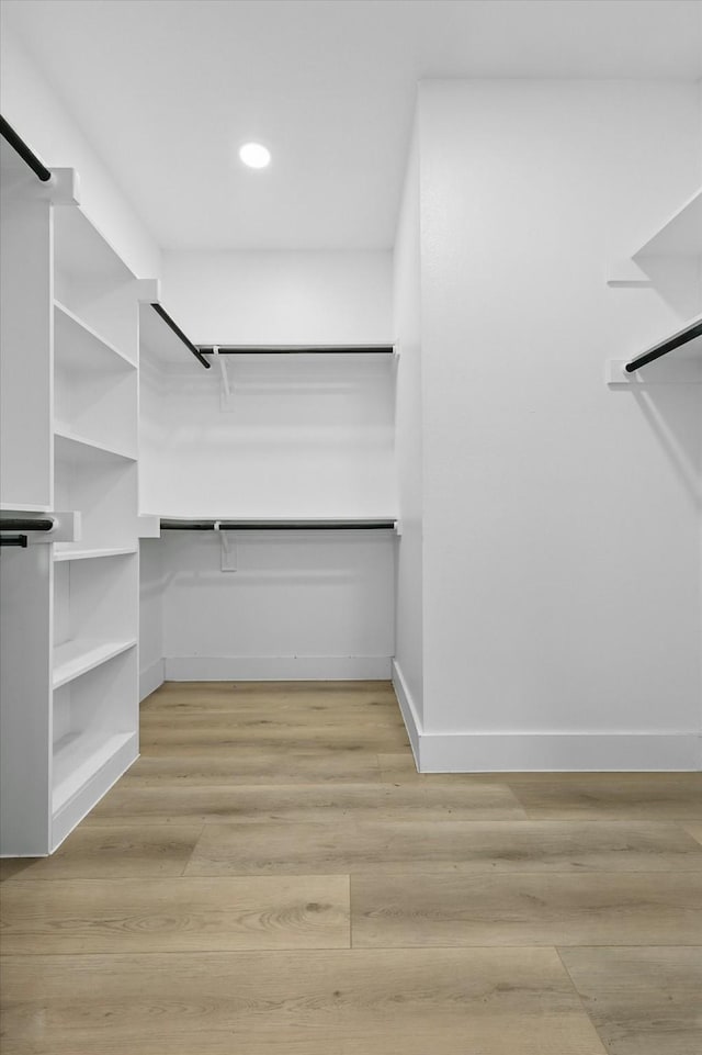 3923 Le May Ave, Dallas, TX 75216 - spacious closet featuring light wood-style flooring