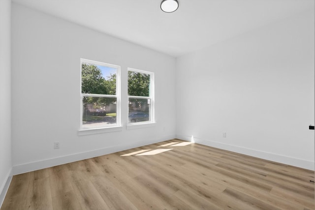 3923 Le May Ave, Dallas, TX 75216 - unfurnished room featuring wood finished floors and baseboards