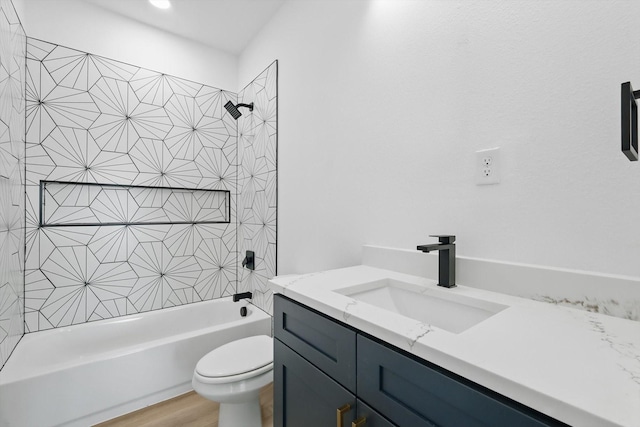 3923 Le May Ave, Dallas, TX 75216 - bathroom with vanity, bathtub / shower combination, toilet, and wood finished floors